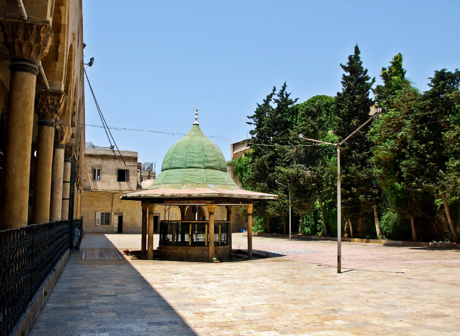 The green domed ablution fountain in the courtyard