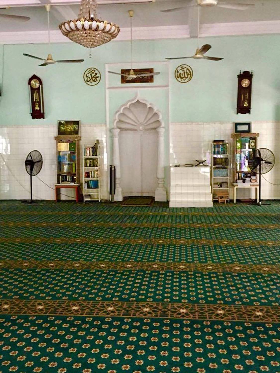 Interior view of prayer hall toward the mihrab niche