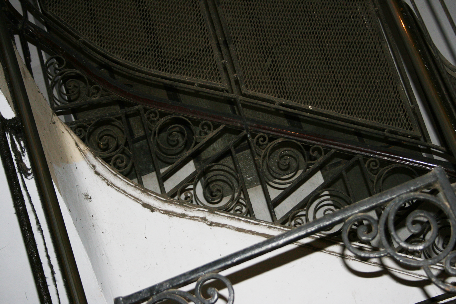 Detail of the interior, staircase with wrought iron decoration