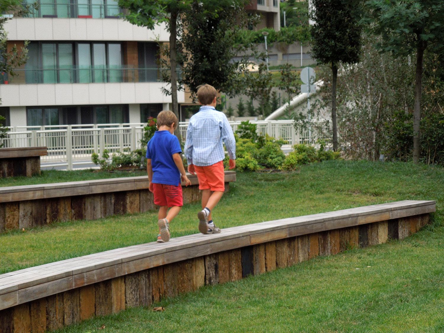 Kids playing on the benches 