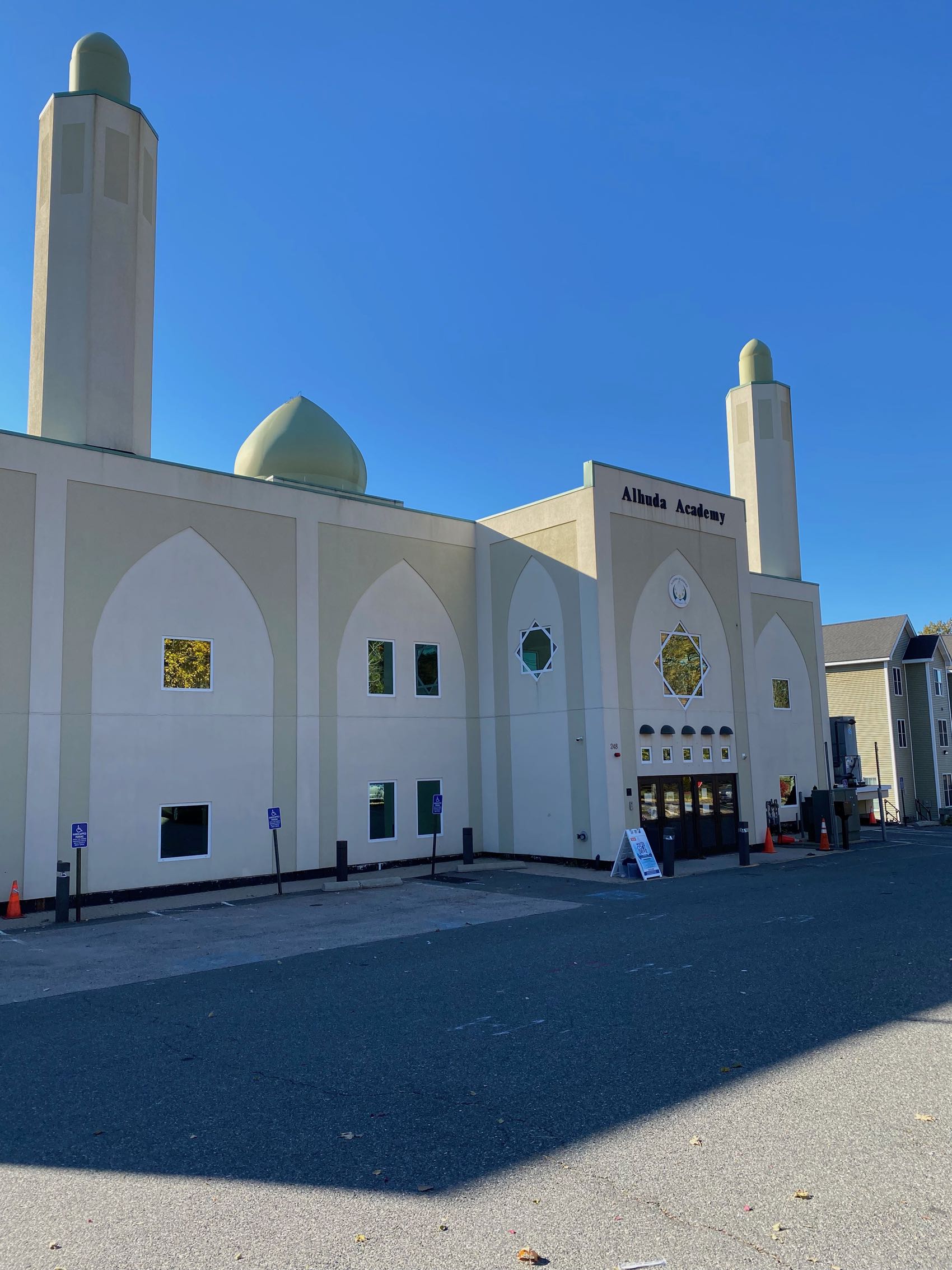 <p>View of the facade and entrance to Alhuda Academy</p>