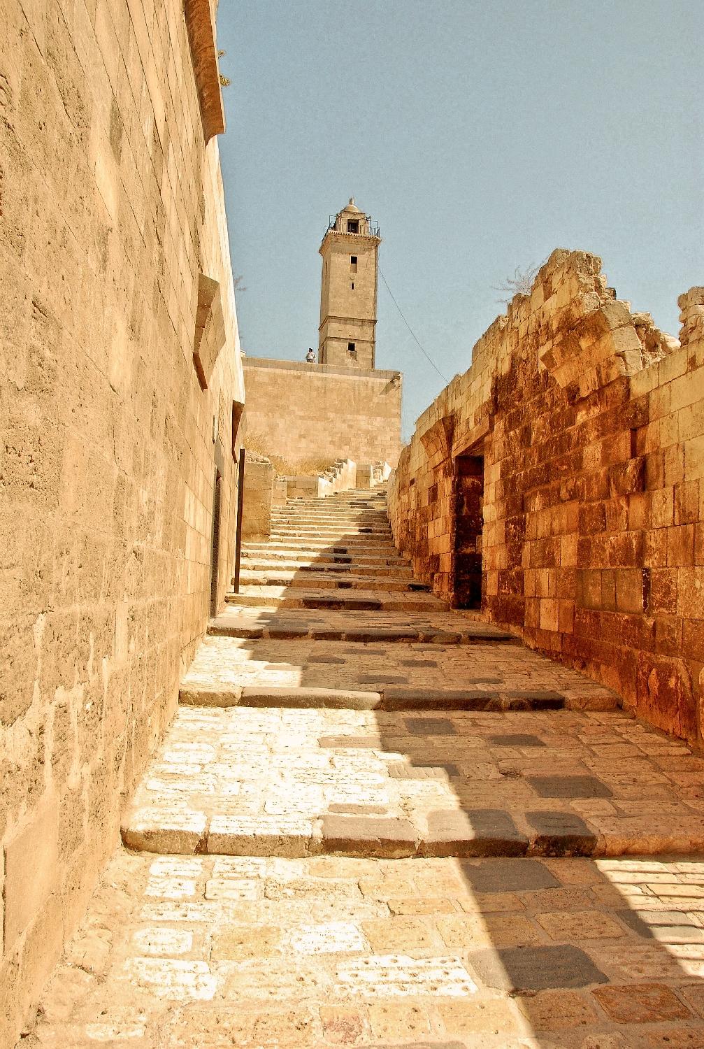 One of the main causeways in the citadel, leading to the Great Mosque.  One of its square minarets is visible in the background.