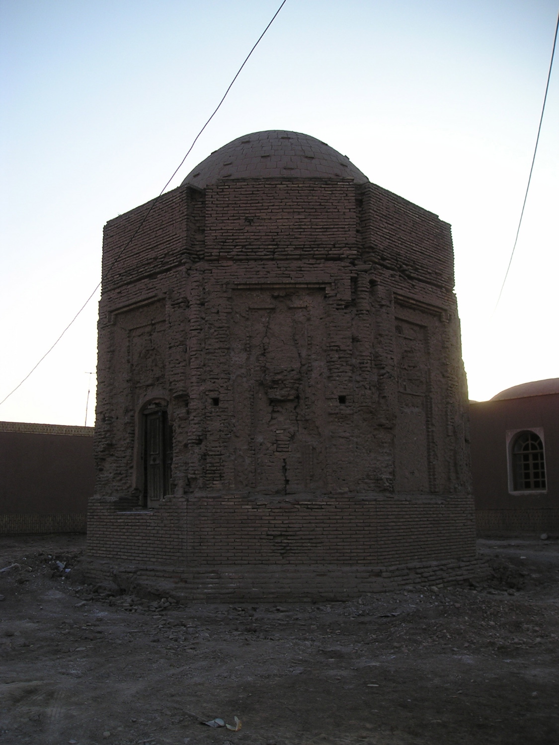 Exterior view of mausoleum, partly destroyed