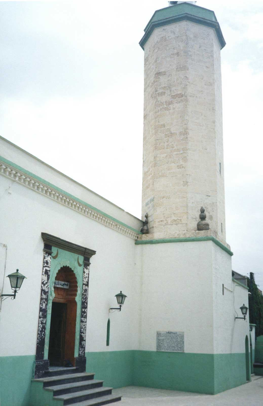 View of the entrance and octagonal minaret