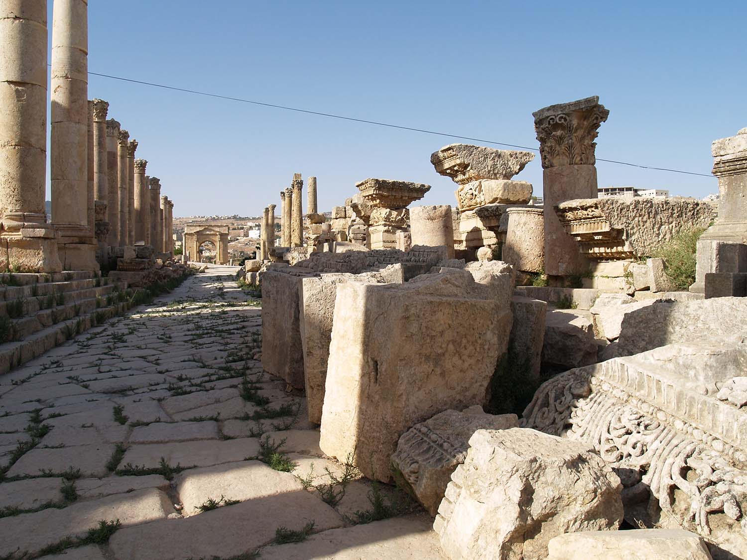 Northward view, ruined columns along the Cardo Maximus; North Tetrapylon in the background