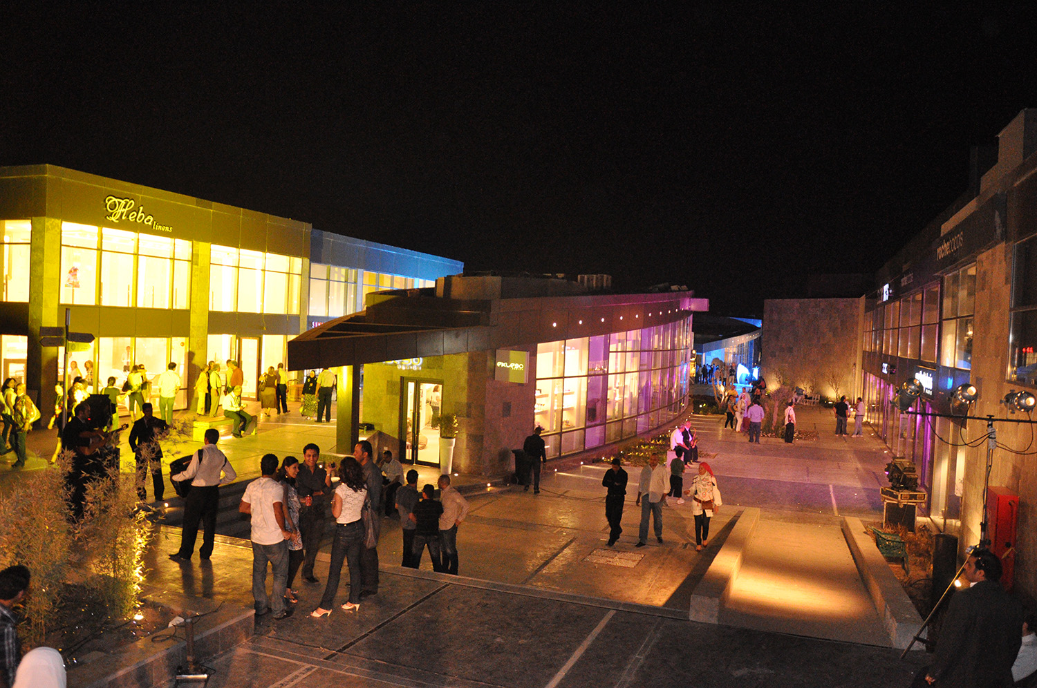 Open-air shopping centre by night