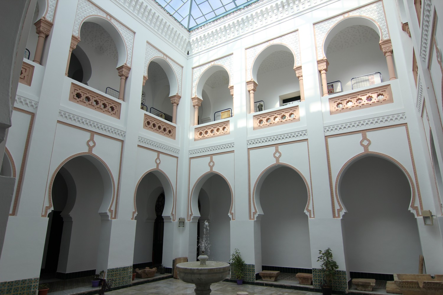 View of the courtyard showing pointed horseshoe arches