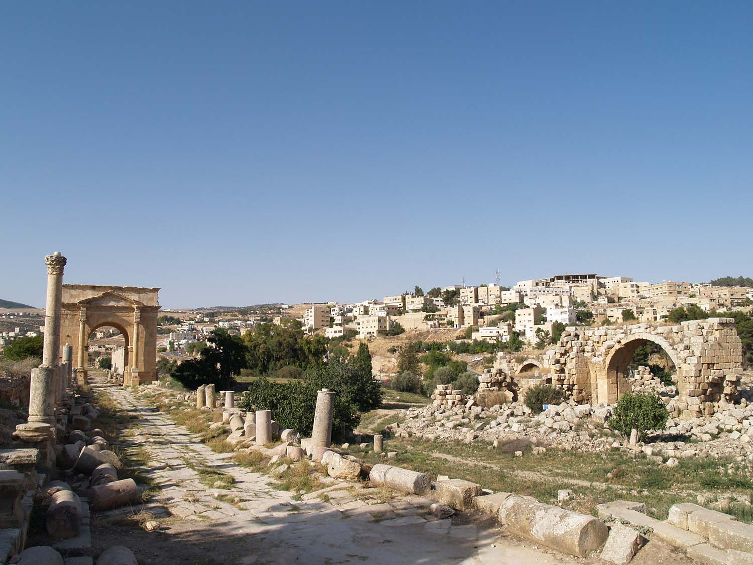 View of North Tetrapylon (left) and West Baths (right) from Cardo Maximus