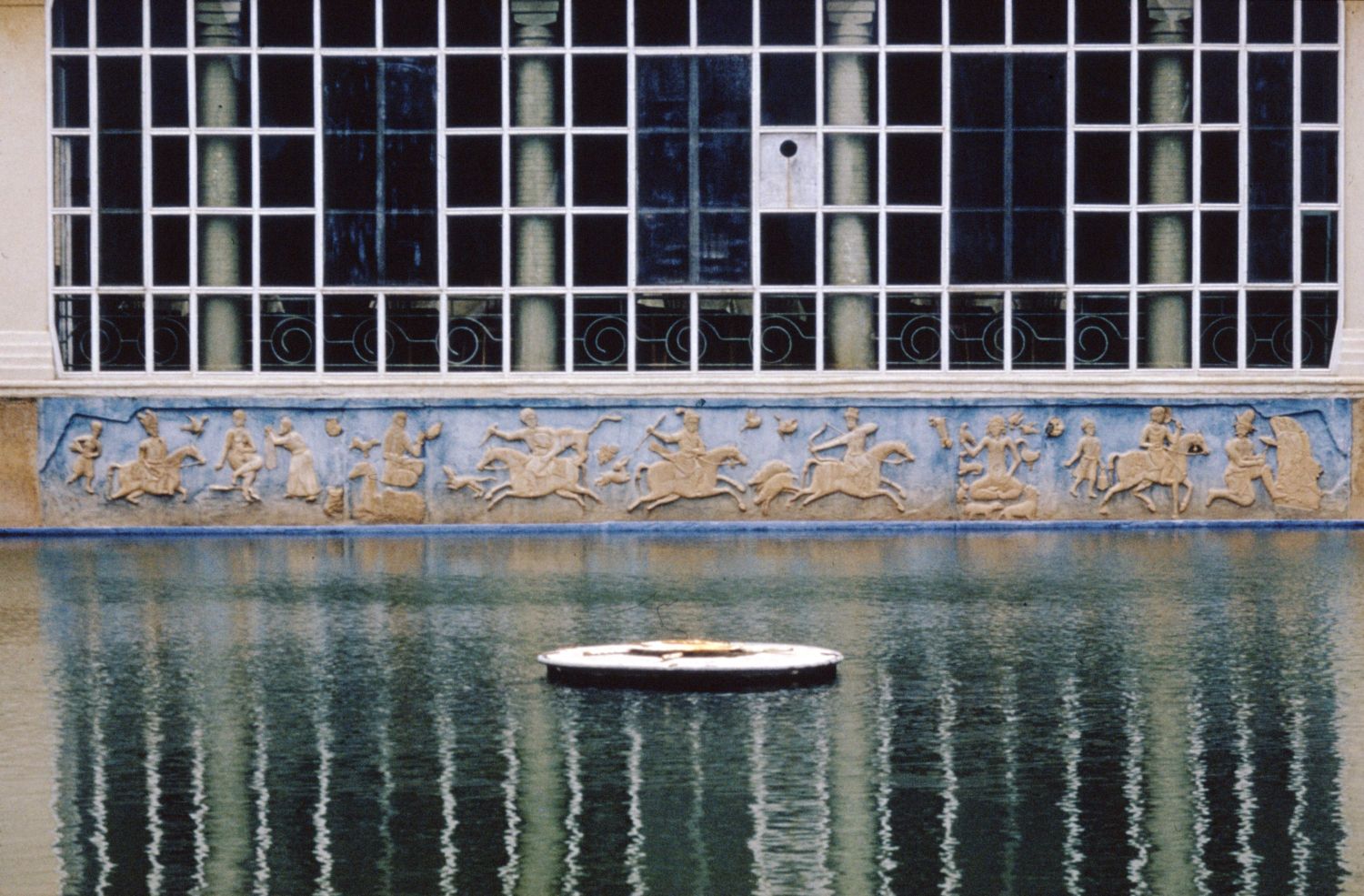 Exterior detail, façade and reflection pool.