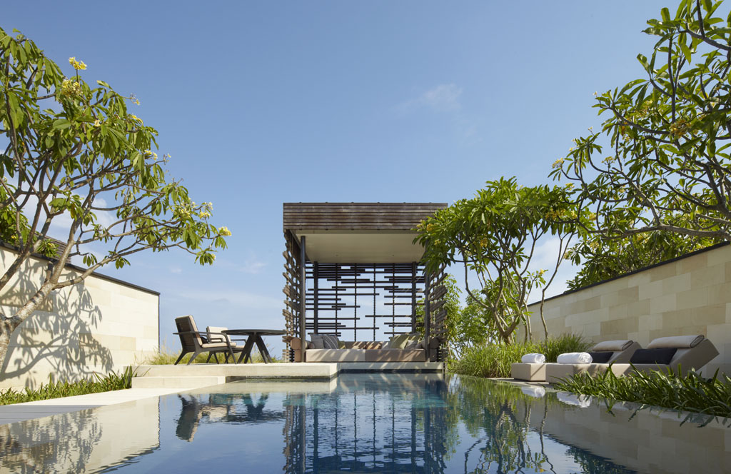 <p>Poolside view of hotel villa cabana</p>