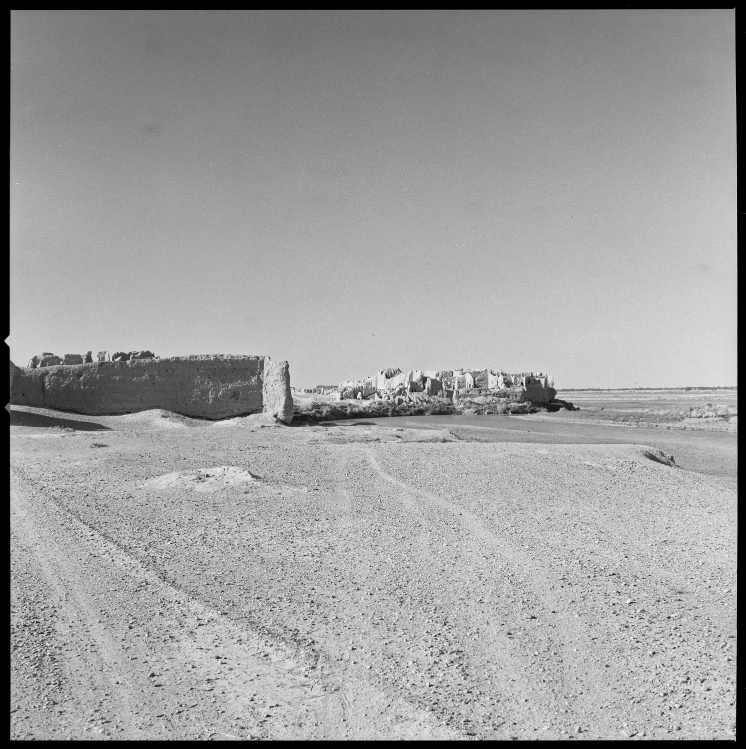 View of ruins at Lashkar-i Bazar, facing south along the Helmand. The so-called "Central Palace" is visible in foreground, and the "South Palace" is visible in background.