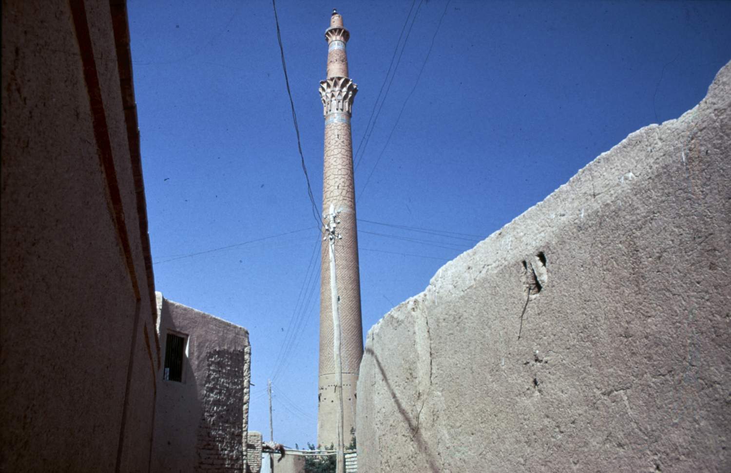 Manar-i Sarban - View of minaret from street in surrounding neighborhood.