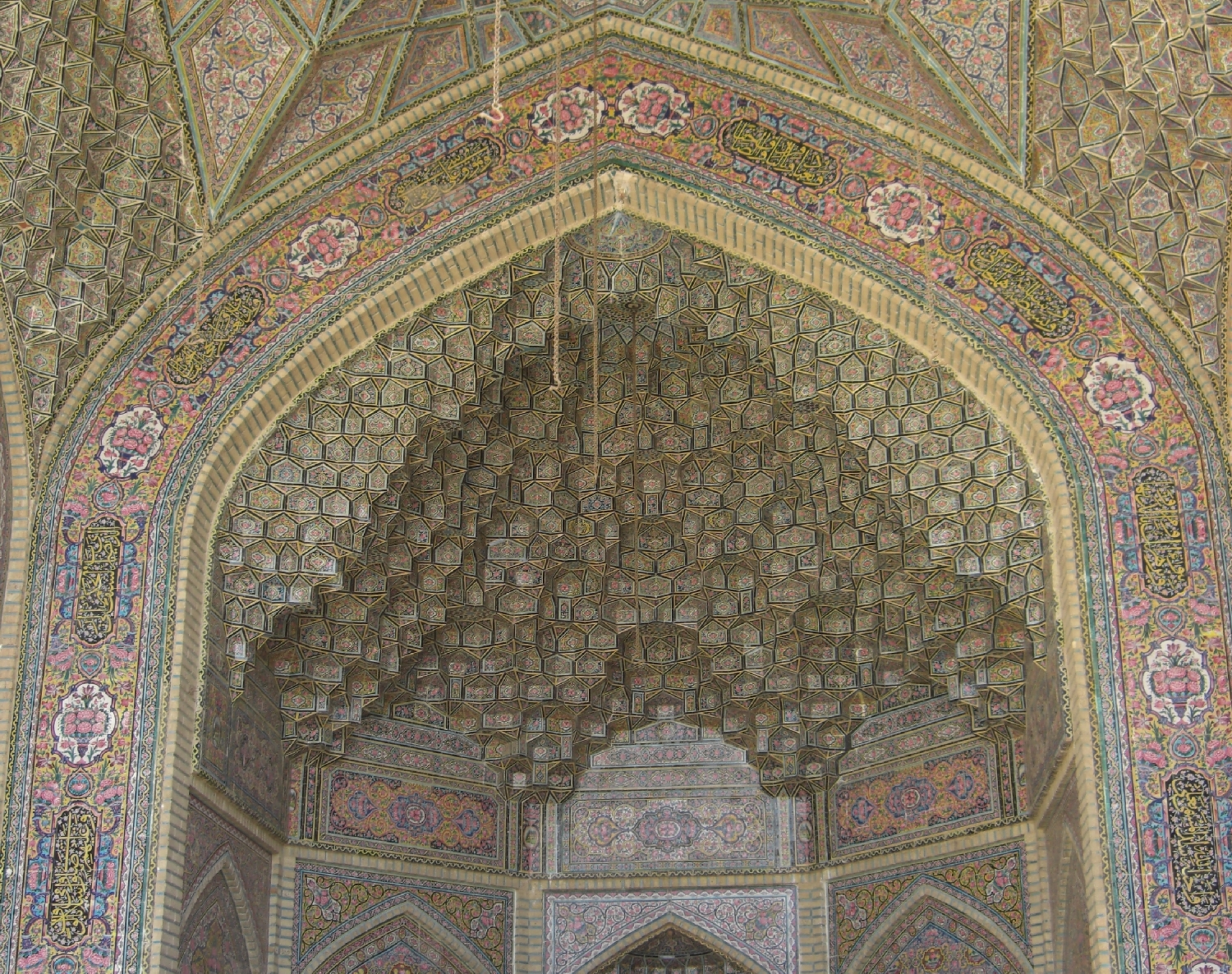 Exterior, detail of tilework and muqarnas