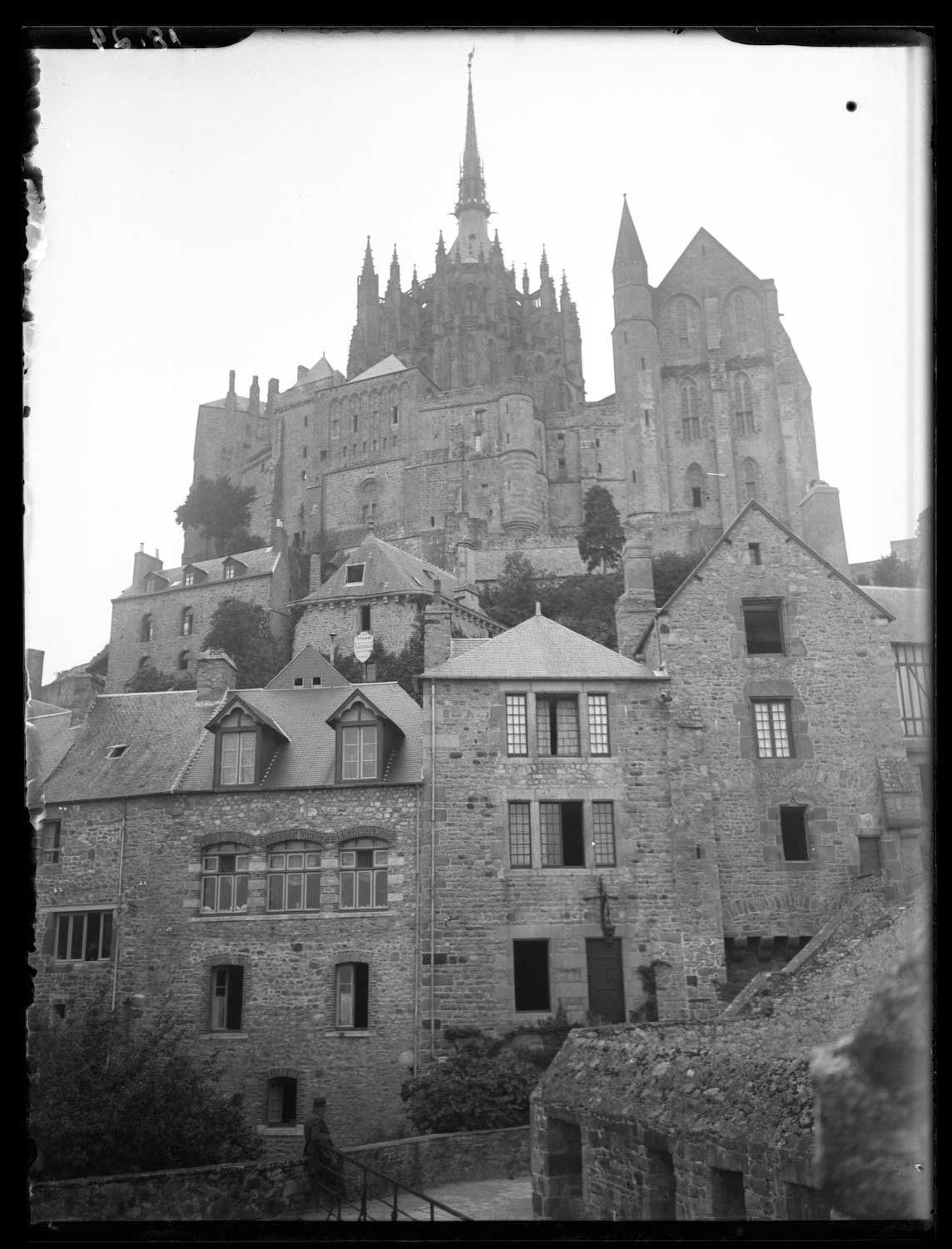 Mont Saint-Michel - View of the Abbey of Mont Saint-Michel viewed from a street in town below.
